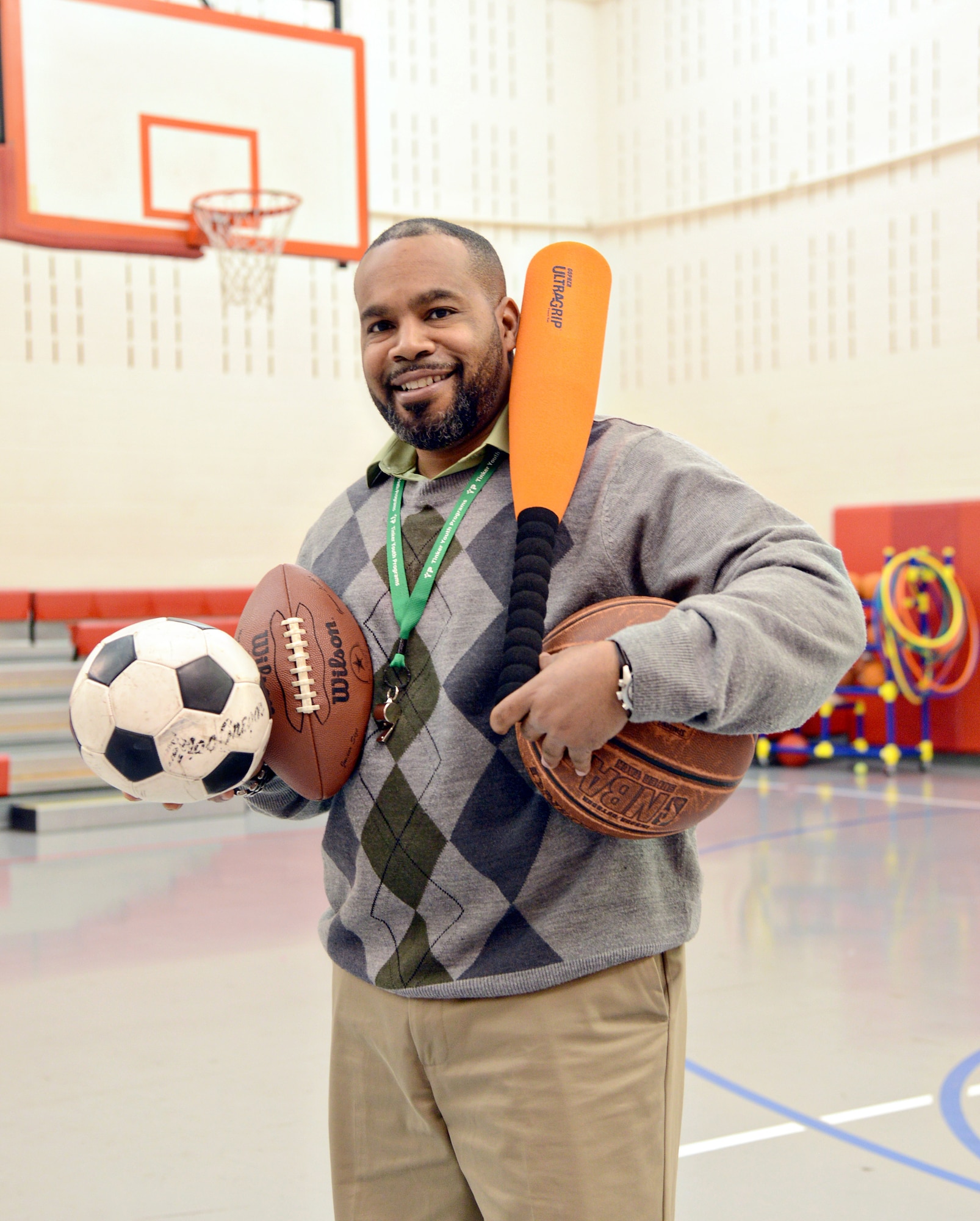 Kelvin Ervin, or more fondly known as “Coach K,” recently won one of 12 national Maytag Dependable Leader Awards by The Boys & Girls Clubs of America, with $20,000 to go toward scholarships for the Tinker Youth Center. Coach K coaches youth sports on base including basketball, football, soccer and baseball to kids ages 3 and up and works for the 424th Supply Chain Management Squadron. (Air Force photo by Kelly White)