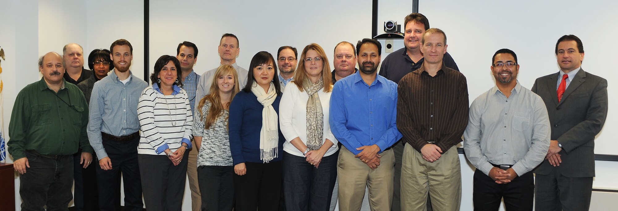 Members of the Improved Fresnel Lens Optical Landing System Phase IV Development team pose with Mauricio Borrero, Program Management Director and site integrator for NAVAIR at Lakehurst, for a photo following receipt of a NAWCAD Commander’s team award. From left to right: Donald Nagy, Keith Wilson, Jackie Powell, Todd Keiser, Dawn Gehrsitz, Aaron White, Thomas Strange, Christine Doeren, Diana Cheng-Yeung, Mitch Friedman, Erica Moss, Ralph Kanzler, Gupreet Aulakh, Alexander Weeks, John Zirkel, Jaime Madera and Borrero. (U.S. Navy photo by Sherry Jacob/Released)