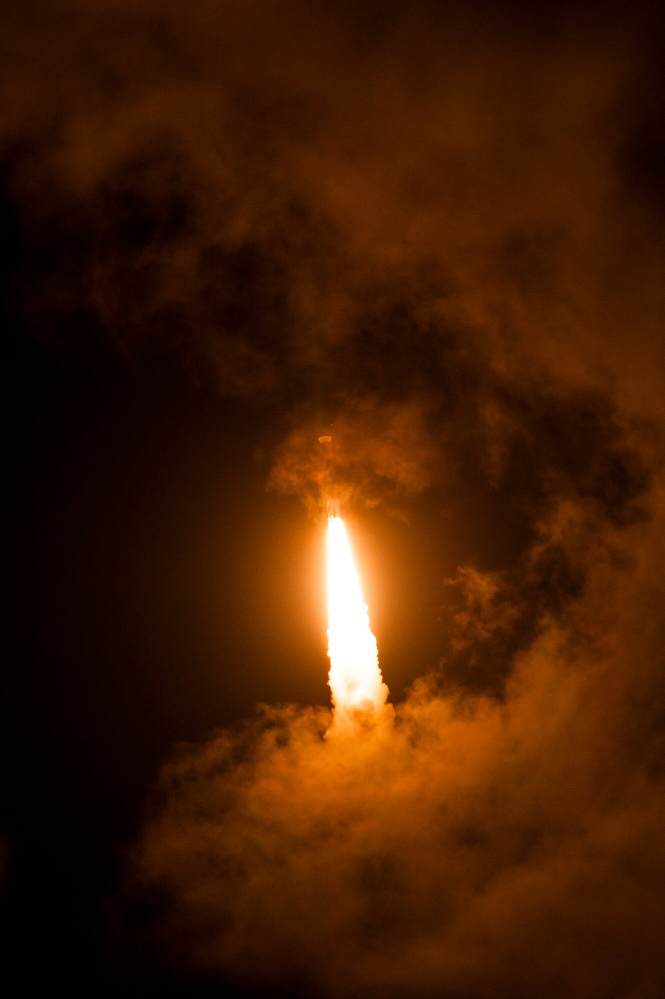 A United Launch Alliance Atlas V rocket carrying a National Reconnaissance Office payload lights the night sky during its launch, Dec. 12, 2014, Vandenberg Air Force Base, Calif. The rocket launched at 7:19 p.m. PDT from Space Launch Complex-3 by Team Vandenberg. (U.S. Air Force photo by Staff Sgt. Jim Araos/Released)