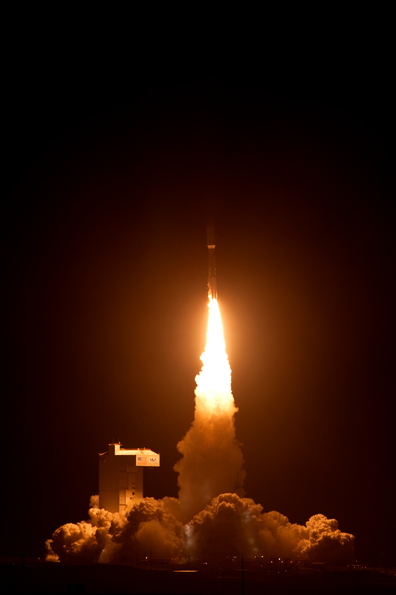 A United Launch Alliance Atlas V rocket carrying a National Reconnaissance Office payload launches, Dec. 12, 2014, Vandenberg Air Force Base, Calif. The rocket launched at 7:19 p.m. PDT from Space Launch Complex-3 by Team Vandenberg. (U.S. Air Force photo by Staff Sgt. Jim Araos/Released)