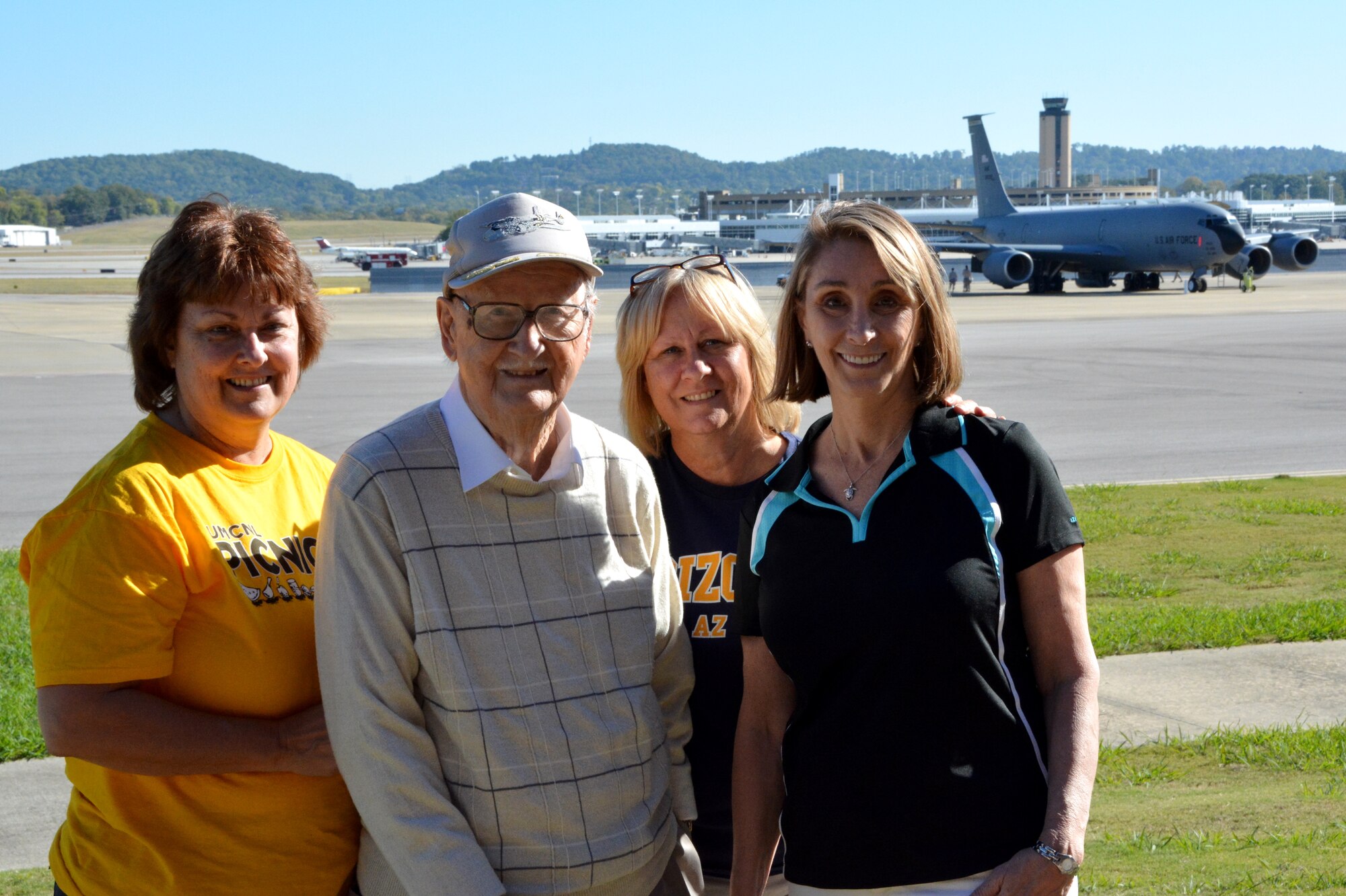 BIRMINGHAM, Ala. -- A World War II veteran and former member of the 106th Observation Squadron revisits the National Guard base here with his daughters on October 24, 2014. Jim Dobrovich, 94, served with the 106th Observation Squadron that is now recognized as the 106th Air Refueling Squadron. He flew on more than 100 flights in the Pacific as a crew chief.  (U.S. Air National Guard photo by: Capt. Jonathan Russell/Released)