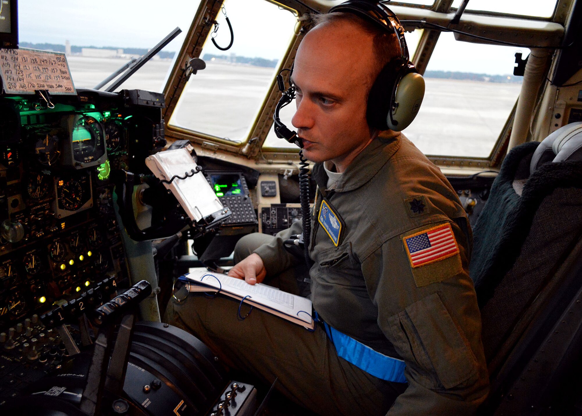 U.S. Air Force Lt. Col. David Morgan, a C-130H Hercules pilot and 43rd Operations Support Squadron commander, conducts preflight checks on an Air Force Reserve C-130H Hercules aircraft prior to airborne operations during the 17th Annual Randy Oler Memorial Operation Toy Drop on Dec. 6 at Green Ramp, Pope Army Airfield, Fort Bragg, North Carolina. Operation Toy Drop is the world’s largest combined airborne operation where Soldiers donate a toy to receive a lottery ticket number that are then randomly drawn for an opportunity to train and jump with foreign jumpmasters over Sicily Drop Zone. Foreign jumpmasters from Poland, Italy, Latvia, Germany, Indonesia and the Netherlands participated in this year’s event. Last year, Operation Toy Drop collected more than 12,000 toys that were donated to local charities and organizations across North Carolina. (U.S. Air Force photo/Marvin Krause)