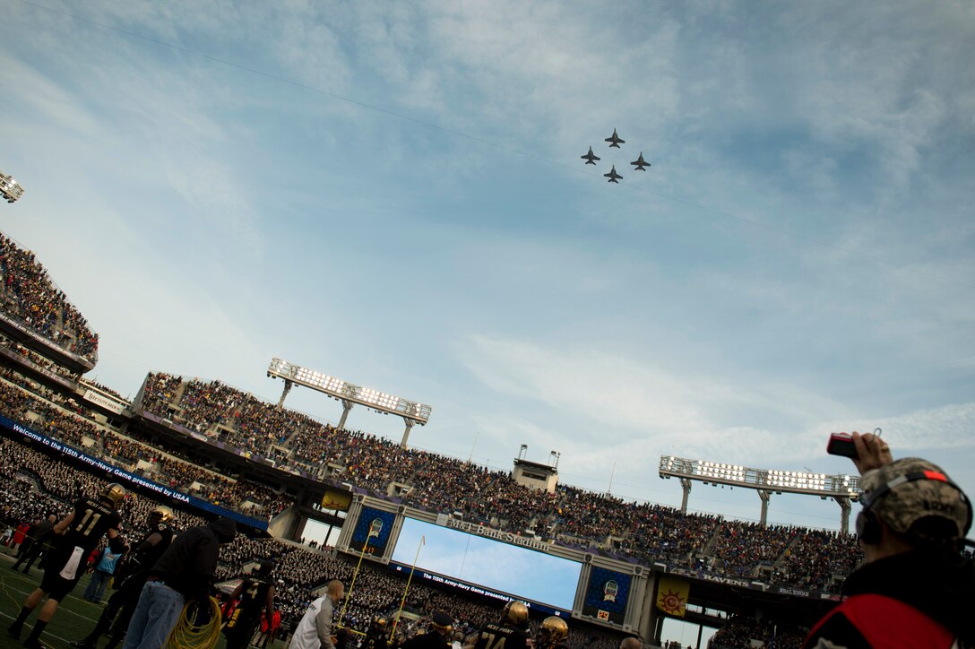 Navy jets perform a flyover before the start of the 115th Army-Navy football game at M&T Stadium in Baltimore, Dec. 13, 2014.