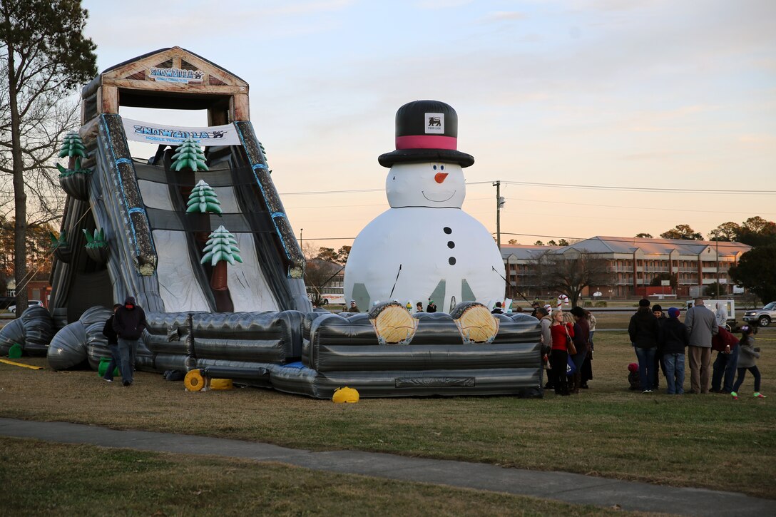 Marines, Sailors and their families gathered for the 2014 Winterfest event at Marine Corps Air Station Cherry Point, N.C., Dec. 13, 2014. The two-day event featured games and activities including bouncy houses and ice skating. The event was hosted by Marine Corps Community Services for Marines, Sailors and their families to kick off the winter season.