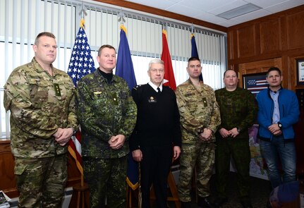 Personnel from the Danish Division meet with Pennsylvania Adjutant General Maj. Gen. Wesley Craig during a visit to Fort Indiantown Gap, Pennsylvania., Dec. 11, 2014. The Danish Division is on a seven-day collaborative planning visit to Pennsylvania to prepare for Saber Strike 2015 with the 28th Infantry Division, Pennsylvania Army National Guard. 