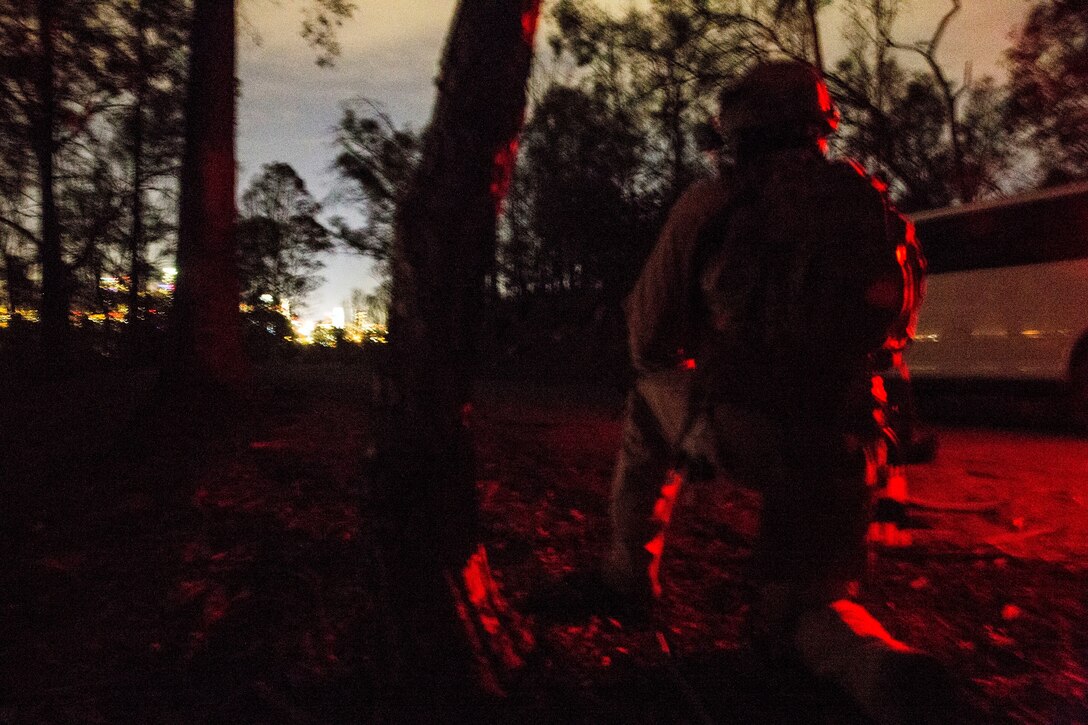 A U.S. Marine with the 15th Marine Expeditionary Unit’s Maritime Raid Force holds security during realistic urban training in Los Angeles Dec. 13, 2014. RUT prepares the 15th MEU’s Marines for their upcoming deployment, enhancing their combat skills in environments similar to those they may find in future missions. (U.S. Marine Corps photo Cpl. Anna Albrecht/Released)