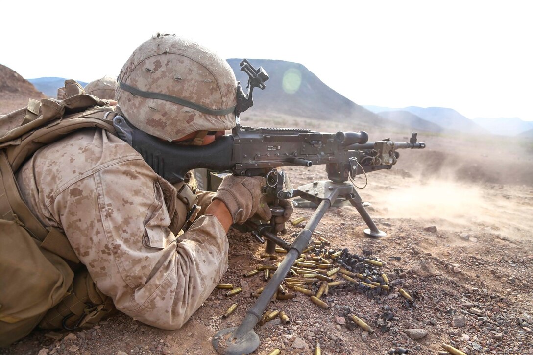 Marines with Golf Company, Battalion Landing Team 2nd Battalion, 1st Marines, 11th Marine Expeditionary Unit (MEU), participate a live-fire and movement range during sustainment training in D'Arta Plage, Djibouti, Dec. 10. The Makin Island Amphibious Ready Group (ARG) and the embarked 11th MEU are deployed in support of maritime security operations and theater security cooperation efforts in the U.S. 5th Fleet area of responsibility. (U.S. Marine Corps photo by Cpl. Laura Y. Raga/Released)