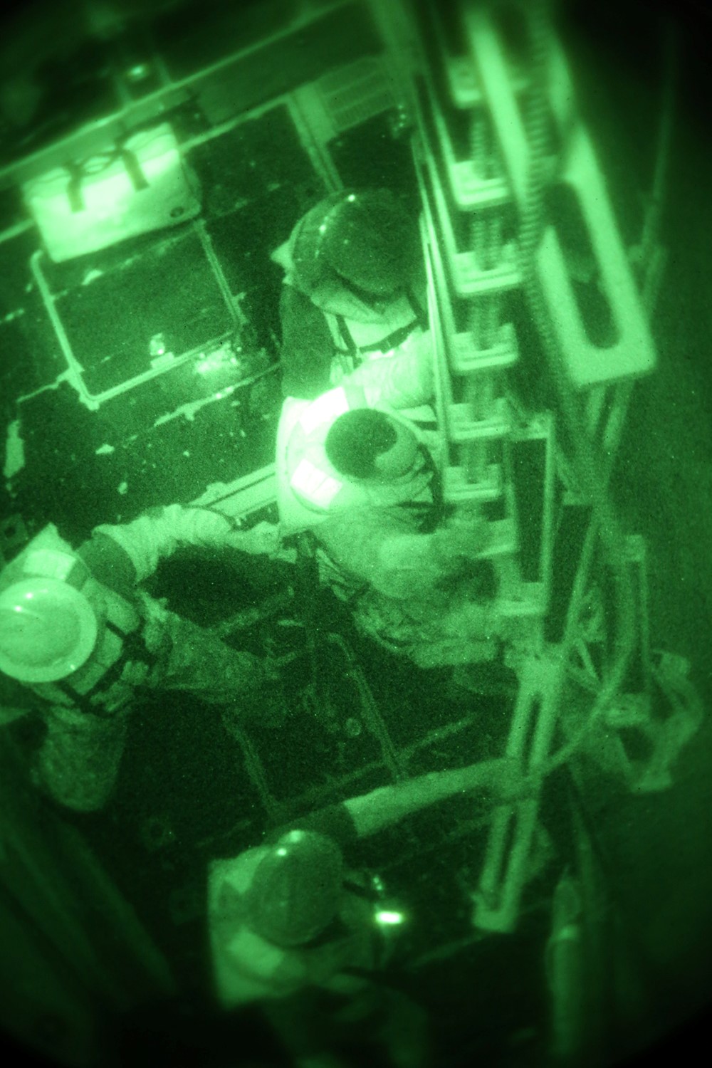 Master Gunnery Sgt. Adrian Virges, operations chief, 11th Marine Expeditionary Unit (MEU), climbs down a ladder from the dock landing ship USS Comstock (LSD 45) into a rigid-hulled inflatable boat (RHIB) with the amphibious transport dock ship USS San Diego (LPD 22) during troop and cargo transport between ships in support of exercise Red Reef 15, Dec. 6, 2014. Red Reef is a bilateral amphibious exercise between the 11th MEU and the Kingdom of Saudi Arabia that focuses on expanding levels of cooperation, enhancing mutual maritime capabilities as well as promoting long-term regional stability and interoperability between U.S. forces and the Kingdom of Saudi Arabia. (U.S. Marine Corps photo by Sgt. Melissa Wenger/ Released)