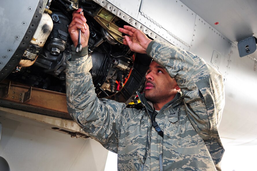Senior Airman Keith Rice, 36th Aircraft Maintenance Unit propulsion systems journeyman, tightens a bolt on an F-16 Fighting Falcon Dec. 12, 2014, during a post flight inspection at Osan Air Base, Republic of Korea. Rice is this week's Airman Spotlight winner. (U.S. Air Force photo by Senior Airman David Owsianka)
