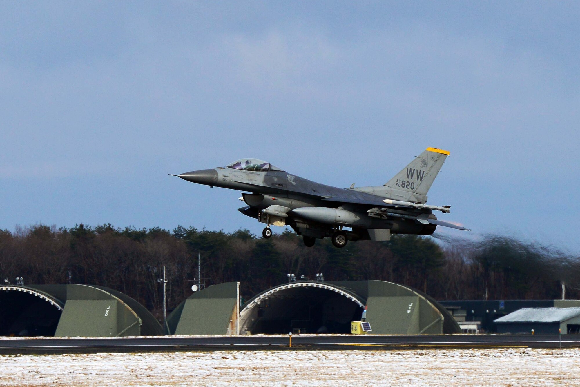 An F-16 Fighting Falcon assigned to the 35th Fighter Wing departs Misawa Air Base, Japan, Dec. 4, 2014. Numerous F-16s left Misawa for Osan AB in support of Beverly Sunrise 15-1, an exercise that deployed more than 200 Airmen and incorporated five Pacific Air Forces bases. (U.S. Air Force photo by Staff Sgt. Derek VanHorn/Released)