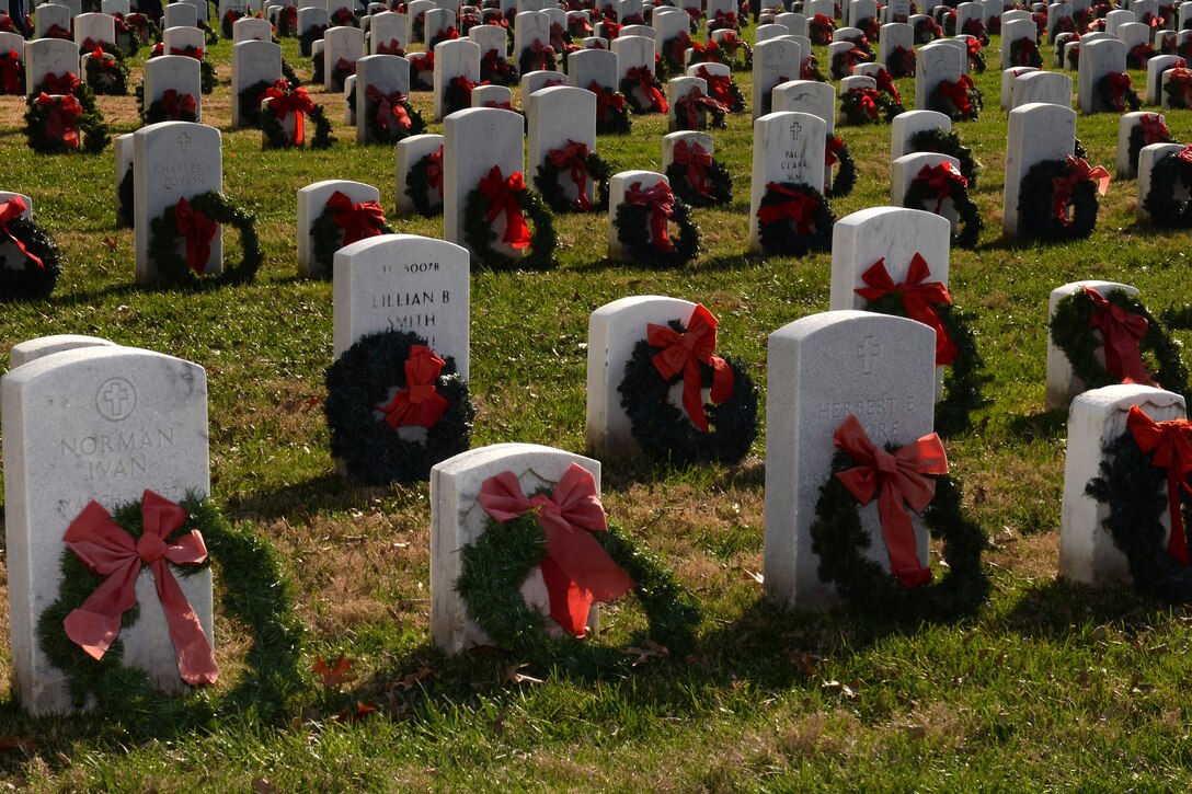 More than 300 members of the local community laid wreaths on more than 7,000 gravesites of fallen U.S. Service members during the Wreaths Across America Day wreath-laying ceremony at the Hampton National Cemetery in Hampton, Va., Dec. 13, 2014. Wreaths are purchased through donations and fundraisers hosted by various organizations throughout the year. (U.S. Air Force photo by Staff Sgt. Teresa J. Cleveland/Released)