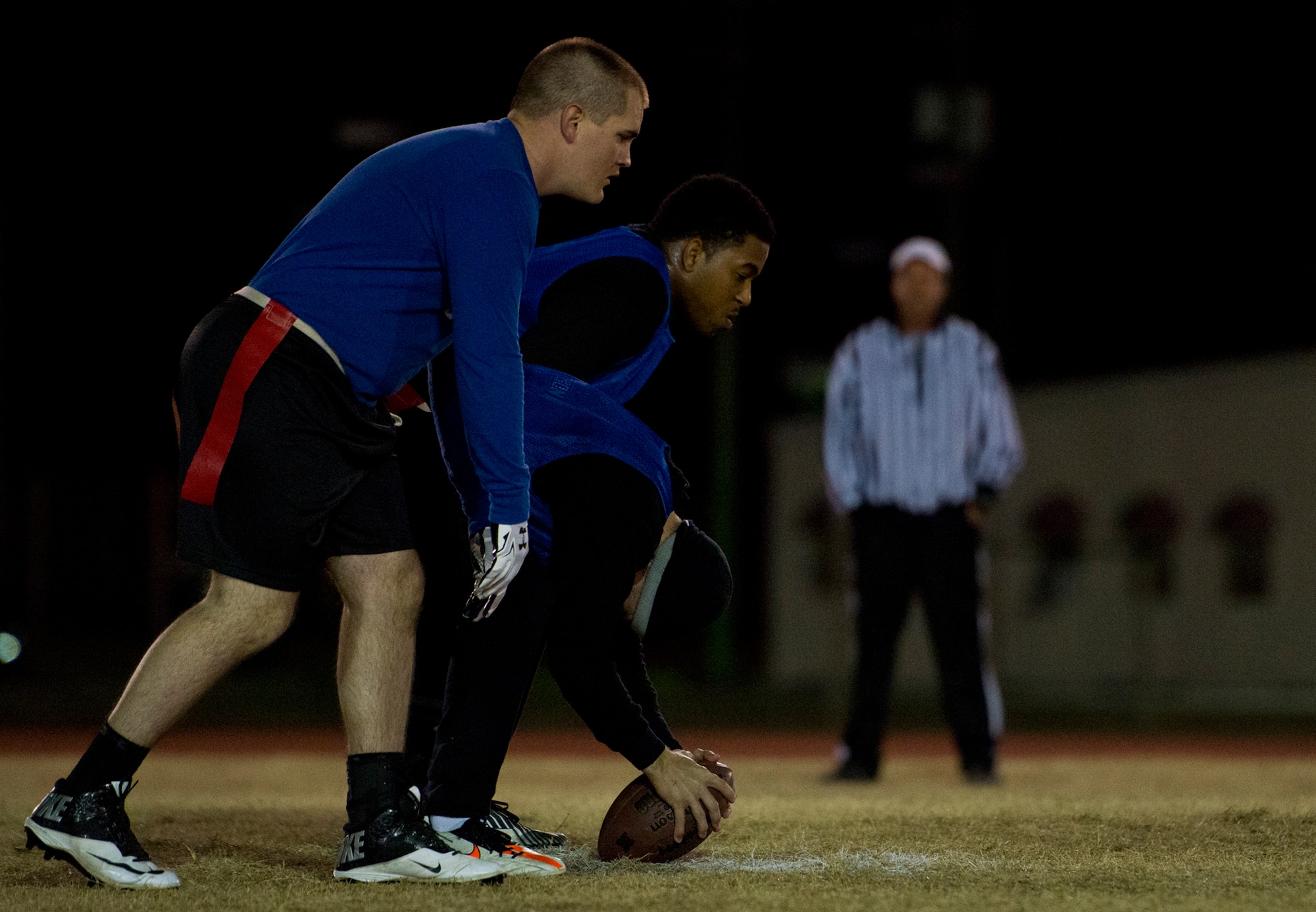 Members of the 96th Security Forces Squadron team line up on offense during the base intramural flag-football championship game Dec. 11 at Eglin Air Force Base, Fla.  The EB team won in an overtime battle 25-24 and repeated as base champions.  (U.S. Air Force photo/Samuel King Jr.)