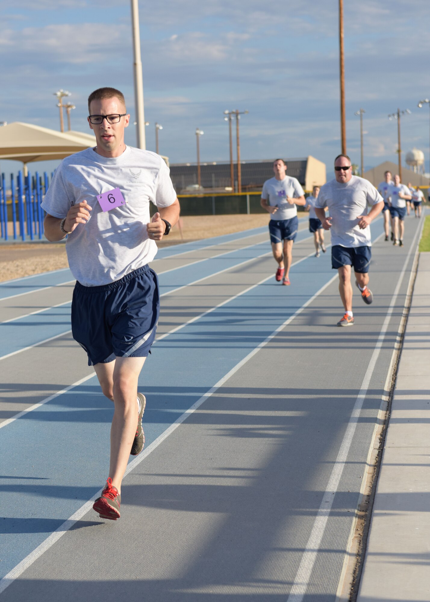 944th Fighter Wing Airmen perform a 1.5 mile run during the cardiovascular portion of their physical fitness test Sept. 7 at Luke Air Force Base, Ariz. (U.S. Air Force photo taken by Staff Sgt. Lausanne Kinder)