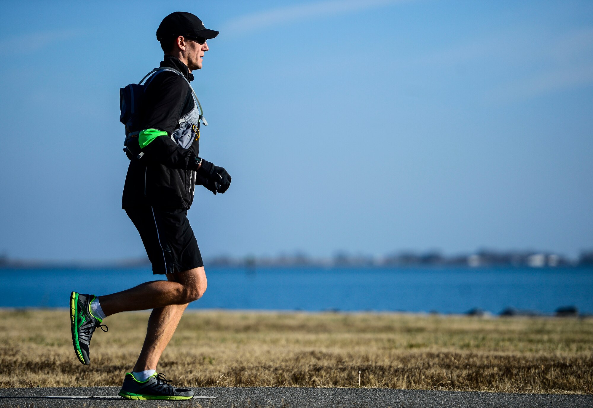 Jonathan Ransom of Chesapeake, Va., participates in the 5th annual Race Round’ the Base at Langley Air Force Base, Va., Dec. 13, 2014. The 10k and 5k races were sponsored by the Peninsula Track Club. (U.S. Air Force photo by Senior Airman Kayla Newman/Released) )  