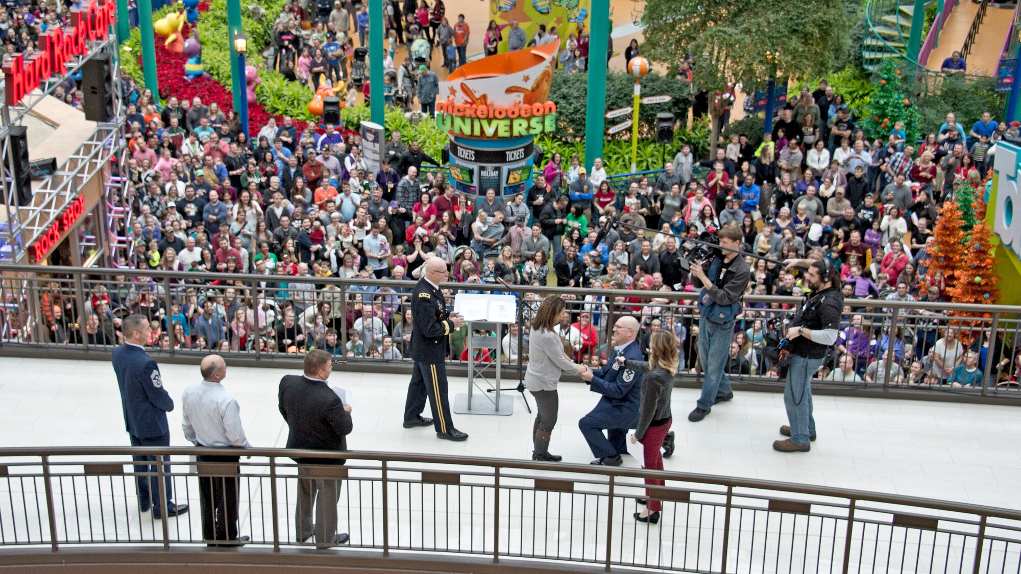 First Sgt. Robert Renning of 133rd Airlift Wing was able to give a surprise proposal to his longtime girlfriend during the Mall of America’s Holiday for Heroes, Dec 14, 2014.  Renning is the Wing’s Outstanding First Sergeant of 2014 and became famous this summer for his life saving efforts of recusing a man from a burning vehicle.  (U.S. Air National Guard Photo by Tech. Sgt. Lynette Olivares / Released)