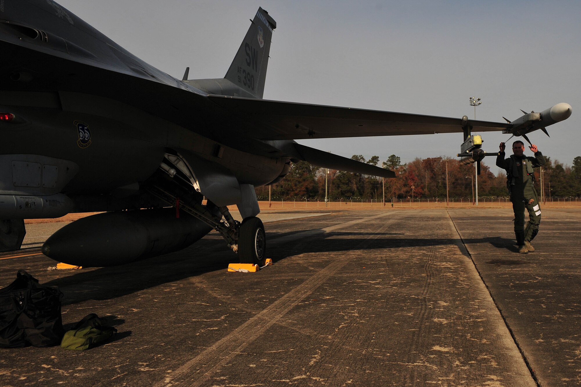 Maj. Gen. H.D. Polumbo Jr., Ninth Air Force commander, inspects his F-16 Fighting Falcon prior to take-off for exercise Razor Talon at Seymour Johnson Air Force Base, North Carolina, Dec. 5, 2014. Razor Talon, a monthly joint-force exercise that combines resources from multiple installations along the East Coast, allows units to keep up-to-date on air-sea training requirements.  (U.S. Air Force photo/Senior Airman John Nieves Camacho)