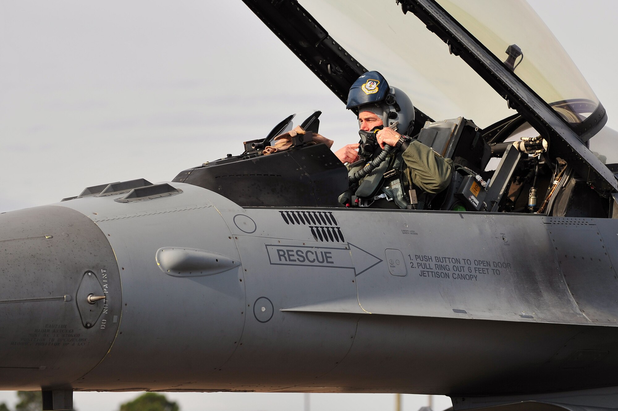 Maj. Gen. H.D. Polumbo Jr., Ninth Air Force commander, settles into the cockpit of his F-16 Fighting Falcon prior to take-off for exercise Razor Talon at Seymour Johnson Air Force Base, North Carolina, Dec. 5, 2014. Razor Talon, a monthly joint-force exercise that combines resources from multiple installations across the East Coast, is designed to integrate air, land and sea forces to promote a more cohesive atmosphere between the different military services. (U.S. Air Force photo/Senior Airman John Nieves Camacho)