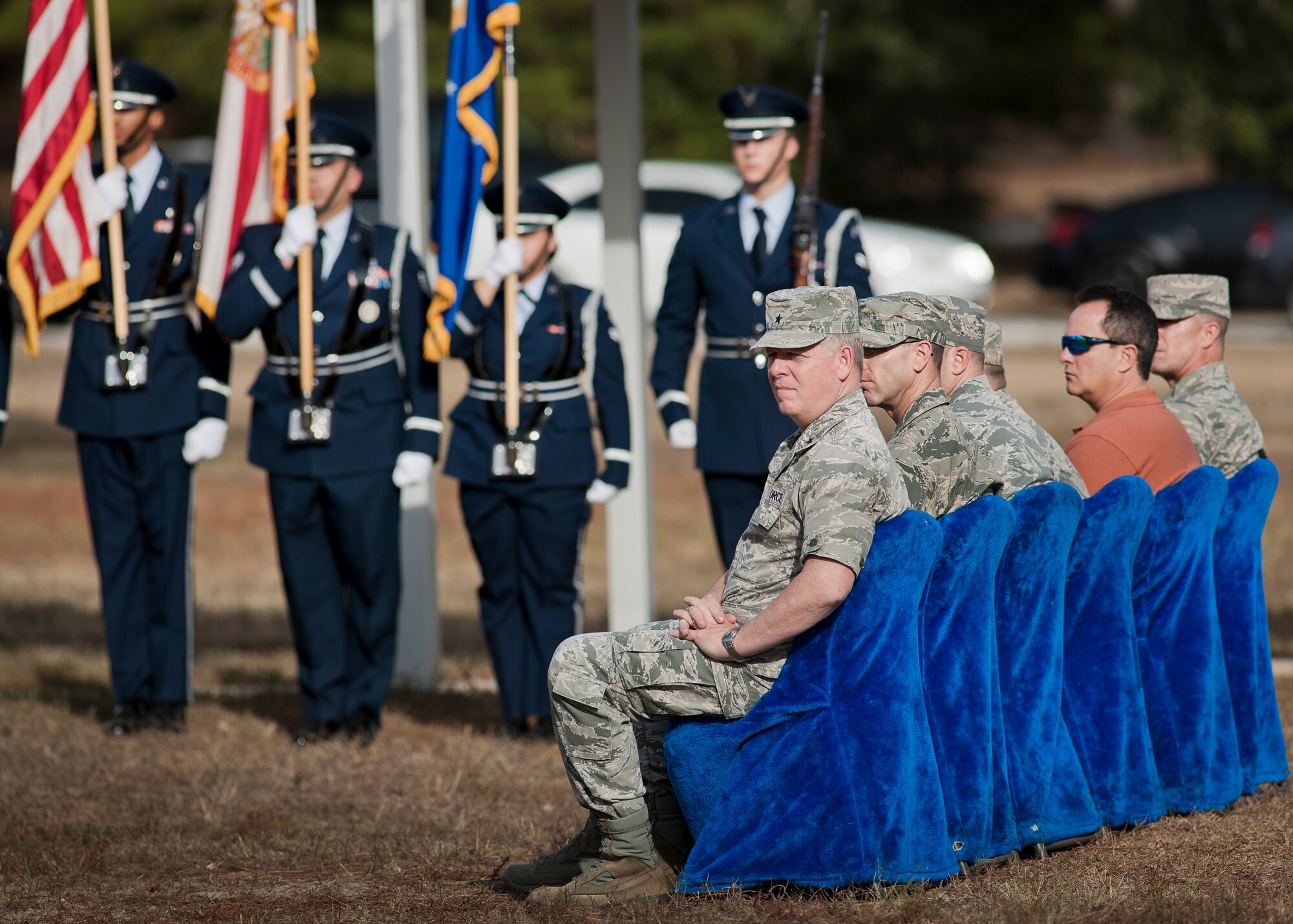 Brig. Gen. David Harris, the 96th Test Wing commander, watches the funeral ceremony at the honor guard graduation Dec. 3 at Eglin Air Force Base, Fla.  Approximately 12 new Airmen graduated from the 80-plus-hour course. The graduation performance is a full military honors funeral to include flag detail, rifle volley, pall bearers and bugler.  (U.S. Air Force photo/Samuel King Jr.)