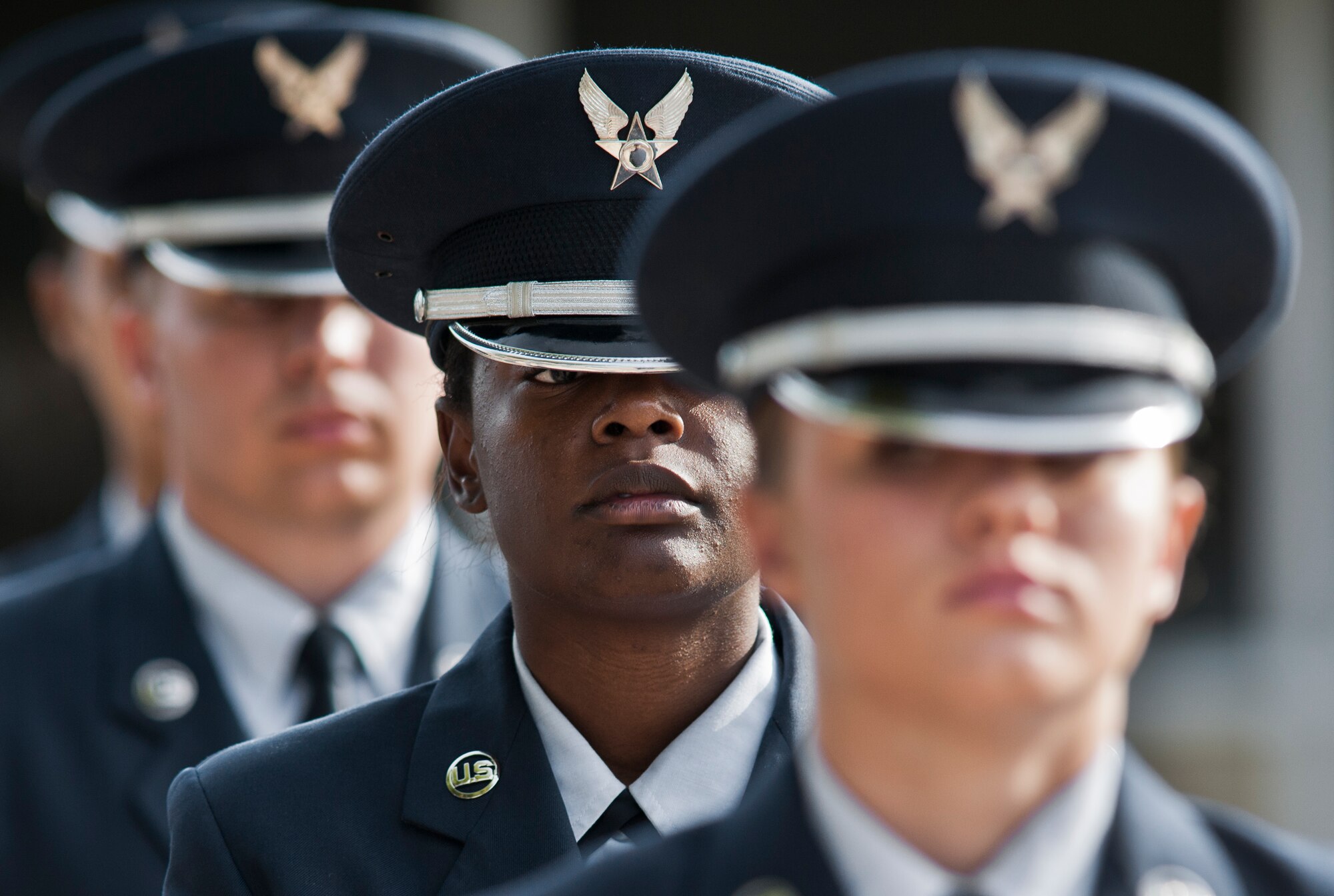 Airman 1st Class Suzanna Brown waits in formation prior to the honor guard graduation Dec. 3 at Eglin Air Force Base, Fla.  Approximately 12 new Airmen graduated from the 80-plus-hour course. The graduation performance is a full military honors funeral to include flag detail, rifle volley, pall bearers and bugler.  (U.S. Air Force photo/Samuel King Jr.)