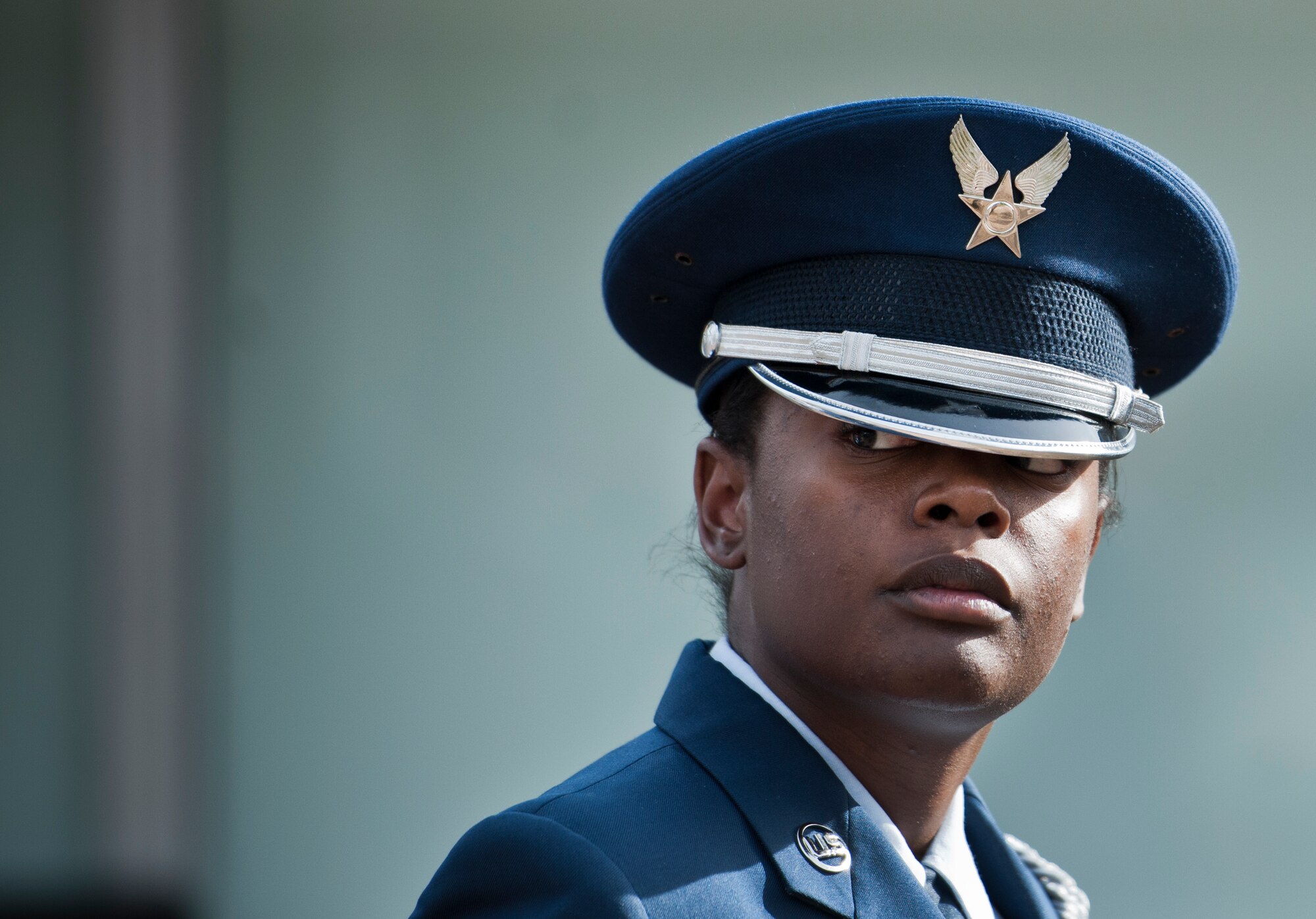 Airman 1st Class Suzanna Brown waits for the funeral ceremony to begin at the honor guard graduation Dec. 3 at Eglin Air Force Base, Fla.  Approximately 12 new Airmen graduated from the 80-plus-hour course. The graduation performance is a full military honors funeral to include flag detail, rifle volley, pall bearers and bugler.  (U.S. Air Force photo/Samuel King Jr.)