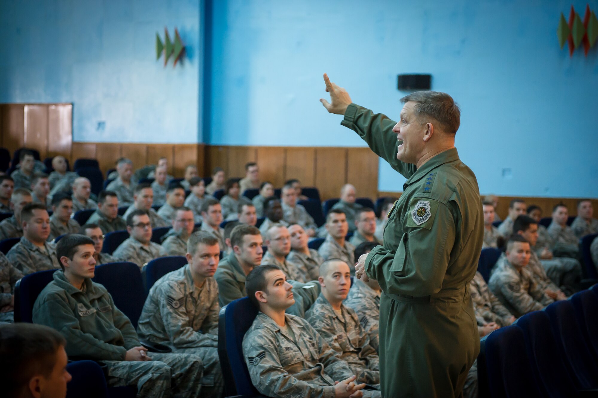 Gen. Frank Gorenc, U.S. Air Forces in Europe and Air Forces Africa commander, speaks to Airmen at Moron Air Base, Spain during a commander's call and base visit Dec. 8, 2014. Gorenc and his command chief, Chief Master Sgt. James E. Davis, toured bases in Europe and Africa to speak to Airmen and answer their questions regarding the future of the Air Force. (U.S. Air Force photo/ Staff Sgt. Ryan Crane)
