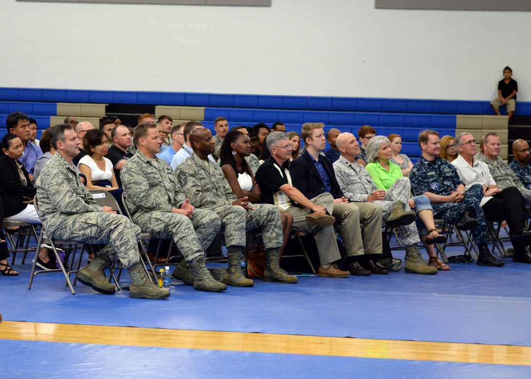 Base leadership attend lecture given by Dr. Ravi Zacharias Dec. 11, 2014, at the Coral Reef Fitness Center at Andersen Air Force Base, Guam. Zacharias is a speaker, apologist and author. (U.S. Air Force photo by Senior Airman Cierra Presentado/Released)