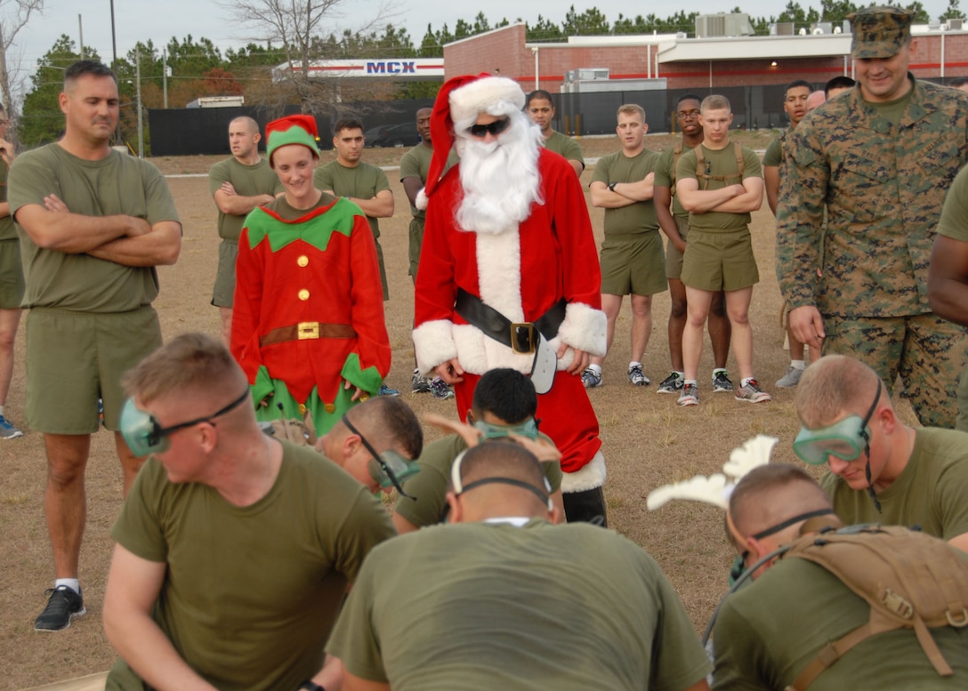 Utilities Instruction Company prepares for their run in the MCES Sleigh Pull.