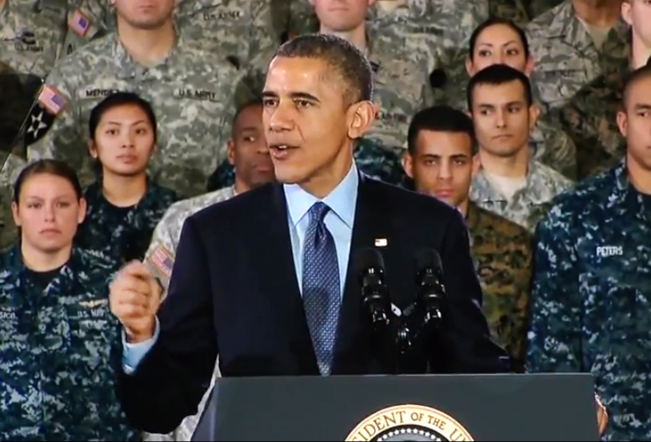 President Barack Obama addressing troops at Joint Base McGuire-Dix-Lakehurst, N.J., Dec. 15, 2014. DoD video still