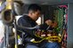 Airman 1st Class Tyler Hill removes a circuit card from a rescue fire truck Dec. 9, 2014, at Joint Base Lewis-McChord, Wash. Replacing a single transistor would take maintenance Airmen an hour versus ordering a new circuit card from the manufacturer taking up to two months to return the fire truck to commission. Hill is a 627th Logistics Readiness Squadron fire truck maintenance journeyman. (U.S. Air Force photo/Staff Sgt. Russ Jackson)