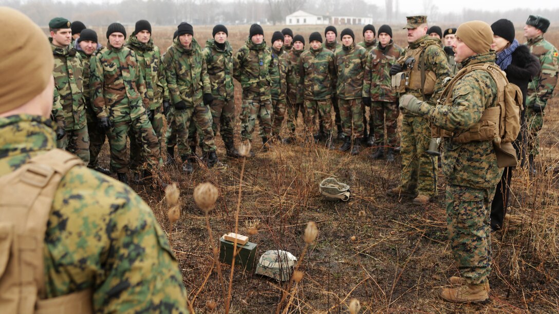 Chief Warrant Officer 2 Michael Reiser, infantry weapons officer from the Black Sea Rotational Force, conducts a safety brief to the crowd of Marines and Moldovans who participated in the workshop prior to a live-fire anti-armor weapons range in Balti, Moldova. The Marines and Moldovans built a mutual understanding of firing procedures and characteristics on advanced anti-armor weapons systems, including: Moldova’s Rocket Propelled Grenade system and 70mm Recoiless Rifle (SPG), and America’s FGM-148 Javelin man-portable anti-tank missile, AT-4 Anti-Tank Weapon, and the Shoulder-launched Multipupose Assault Weapon, Dec. 8-12.