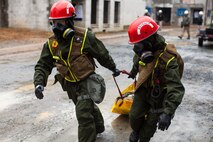 Marines and Sailors with the Chemical Biological Incident Response Force, II Marine Expeditionary Force put their training to use during Exercise Sudden Response aboard Marine Corps Base Quantico on Friday, December 5. Exercise Sudden Response is a Joint Task Force Civil Support exercise designed to challenge the combined forces with multiple scenarios, which could be encountered during a chemical, biological, radiological, nuclear or high-yield explosive incident. CBIRF trained along side the 911th Technical Rescue Engineer Company, the 89th Chemical Company, 3rd Armored Cavalry Regiment, and the 720th Military Police Battalion. CBIRF is prepared to respond, with minimal warning, to any CBRNE event in order to assist local, state, or federal agencies and the geographic combatant commanders in the conduct of CBRNE response or consequence management operations. (Official Marine Corps Photo by Sgt. Kuande L. Hall/RELEASED).
