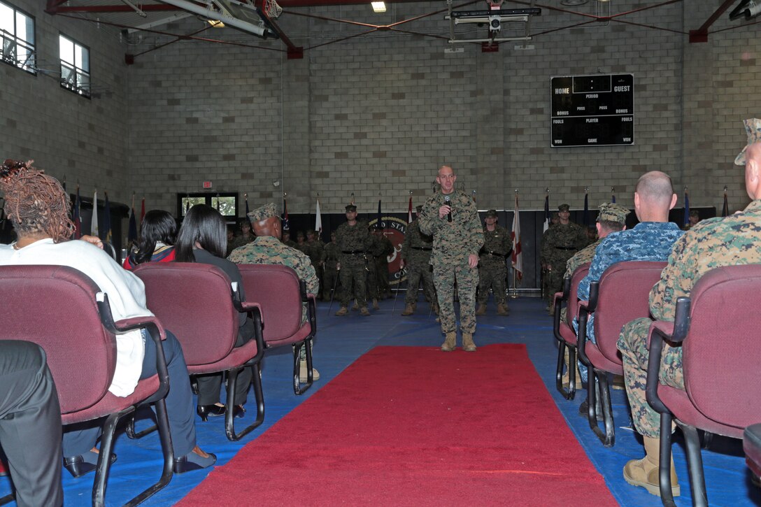 U.S. Marines and Sailors with 13th Marine Expeditionary Unit (13th MEU) conduct a Change of Command ceremony at the 21 Area fitness center aboard Camp Pendleton, Calif., Dec. 12, 2014. During the Change of Command ceremony, LtCol. Joseph Lagoski relinquished command of the 13th MEU to Col. Anthony Henderson. (U.S. Marine Corps photo by Cpl. David Gonzalez, 13th Marine Expeditionary Combat Camera/ Released)
