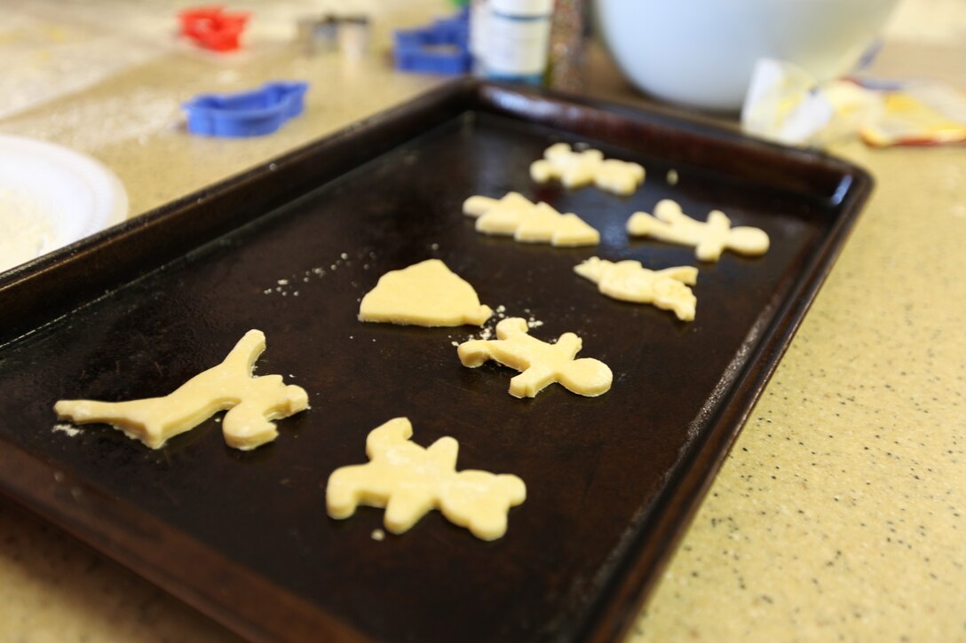Cookies made by Marines with Marine Air Control Squadron 2 wait for the oven on a counter at the Ronald McDonald House in Greenville, N.C., Dec. 13, 2014. Seven Marines and two spouses with MACS-2 volunteered to make cookies for the families living temporarily at the Ronald McDonald House. The volunteers made more than 200 cookies to help spread holiday cheer to families of sick or injured children receiving medical treatment in Greenville.  