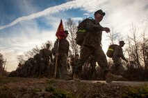 The Marines and Sailors of the Chemical Biological Incident Response Force, II Marine Expeditionary Force conduct a 9-mile conditioning hike on December 12 aboard Naval Support Facility Indian Head. (Official Marine Corps Photo by Sgt. Kuande L. Hall/RELEASED).