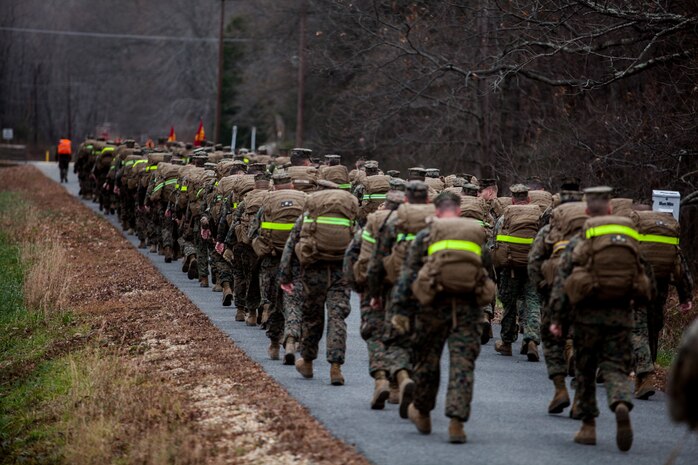 The Marines and Sailors of the Chemical Biological Incident Response Force, II Marine Expeditionary Force conduct a 9-mile conditioning hike on December 12 aboard Naval Support Facility Indian Head. (Official Marine Corps Photo by Sgt. Kuande L. Hall/RELEASED).