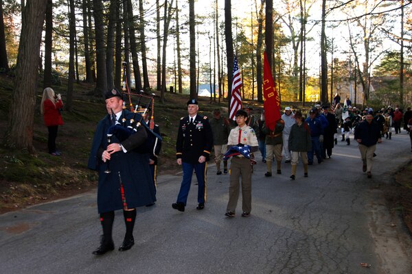 Col. Christopher Barron marches in the procession into Sleepy Hollow Cemetery.  Col. Barron represented the New England District in the Flag Retirement Ceremony held on Veterans Day at Sleepy Hollow Cemetery in Concord, Mass.  Col. Barron spoke to the crowd urging everyone to honor Veterans, not just on Veterans Day, but every day.