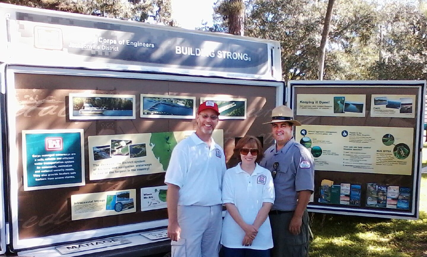Corps water safety volunteers Michael and Terri Young and park ranger Brian Scott Older used the Corps interpretive multi-use trailer to teach members of the community about water safety and other Corps missions at Kiwanis Kids Day in LaBelle.