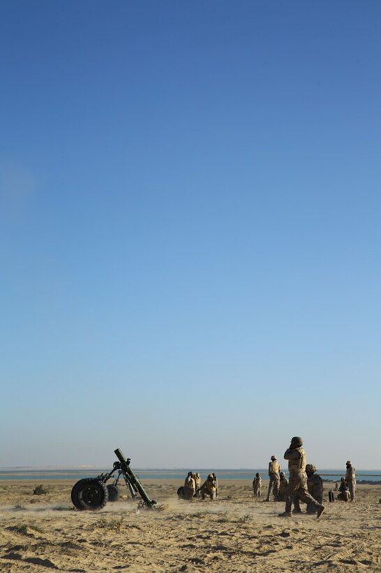 A Royal Saudi Naval Forces Marine with the 3rd Marine Infantry Battalion fires a 120mm mortar system during a joint mortar range with U.S. Marines from the 11th Marine Expeditionary Unit (MEU) during exercise Red Reef 15 in the U.S. 5th Fleet area of responsibility, Dec 12, 2014. Red Reef is part of a routine theater security cooperation engagement plan between the U.S. Navy, U.S. Marine Corps and Royal Saudi Naval Forces that serves as an excellent opportunity to strengthen tactical proficiency in critical mission areas and support long-term regional security.
 (U.S. Marine Corps photo by Cpl. Jonathan R. Waldman/Released)
