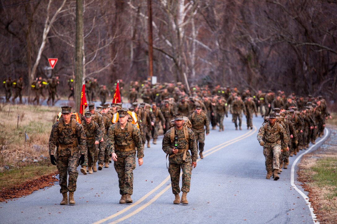 The Marines and Sailors of the Chemical Biological Incident Response Force, II Marine Expeditionary Force conduct a 9-mile conditioning hike on December 12 aboard Naval Support Facility Indian Head. 