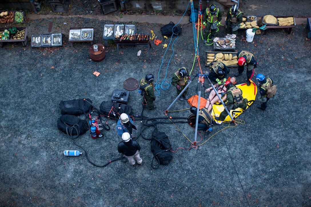 Marines and Sailors with the Chemical Biological Incident Response Force, II Marine Expeditionary Force put their training to use during Exercise Sudden Response aboard Marine Corps Base Quantico on Friday, December 5. Exercise Sudden Response is a Joint Task Force Civil Support exercise designed to challenge the combined forces with multiple scenarios, which could be encountered during a chemical, biological, radiological, nuclear or high-yield explosive incident. CBIRF trained along side the 911th Technical Rescue Engineer Company, the 89th Chemical Company, 3rd Armored Cavalry Regiment, and the 720th Military Police Battalion. CBIRF is prepared to respond, with minimal warning, to any CBRNE event in order to assist local, state, or federal agencies and the geographic combatant commanders in the conduct of CBRNE response or consequence management operations. (Official Marine Corps Photo by Sgt. Kuande L. Hall/RELEASED).