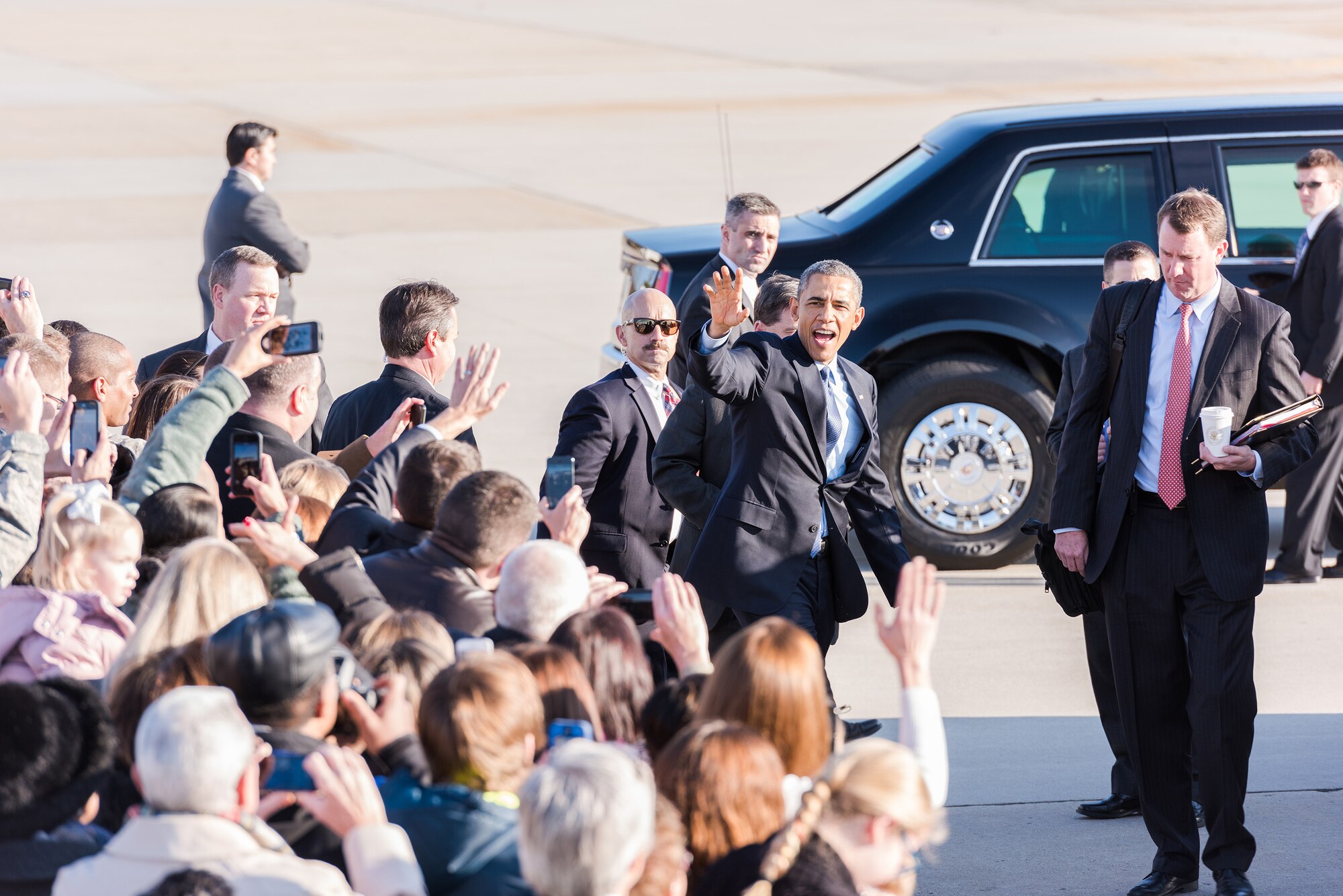 President Barack Obama greets service members and Department of Defense civilians on McGuire Field Dec. 15, 2014, at Joint Base McGuire-Dix-Lakehurst, N.J. Obama visited JB MDL to thank service members for their service to the nation. (U.S. Air Force photo by Robert Williard/Released)