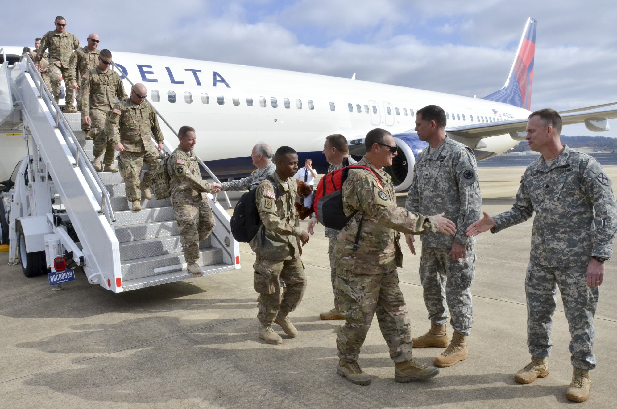 More than 158 Alabama Army National Guard Soldiers from the 877th Engineering Battalion arrive at the 117th Air Refueling Wing, Birmingham Alabama as they return home from a deployment in support of Operation Enduring Freedom. The 877th provided engineer support for the CENTCOM Material Recovery Element, assisting the United States Central Command Material Retrograde Element (CMRE) with recovery of military equipment to the U.S. from Afghanistan.(U.S. Air National Guard photo by: Senior Master Sgt. Ken Johnson/Released)