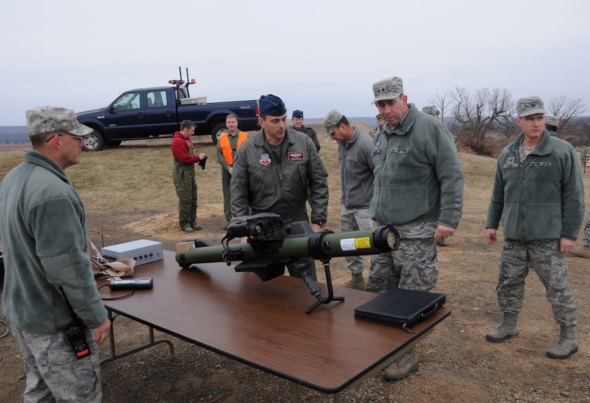 Maj. Doug Davis, 188th Wing Detachment 1 Razorback Range commander, shows Maj. Gen. John Shanahan, commander of the 25th Air Force, the man-portable aircraft survivability trainer at Ebbing Air National Guard Base, Fort Smith, Ark., Dec. 11, 2014. The MAST is a live-training device used to train aircrews to react to surface-to-air missile threats during live-training exercises. Shanahan’s visit encompassed seeing and understanding how the wing’s new mission aligns with the 25th AF. (U.S. Air National Guard photo by Airman 1st Class Cody Martin/released)
