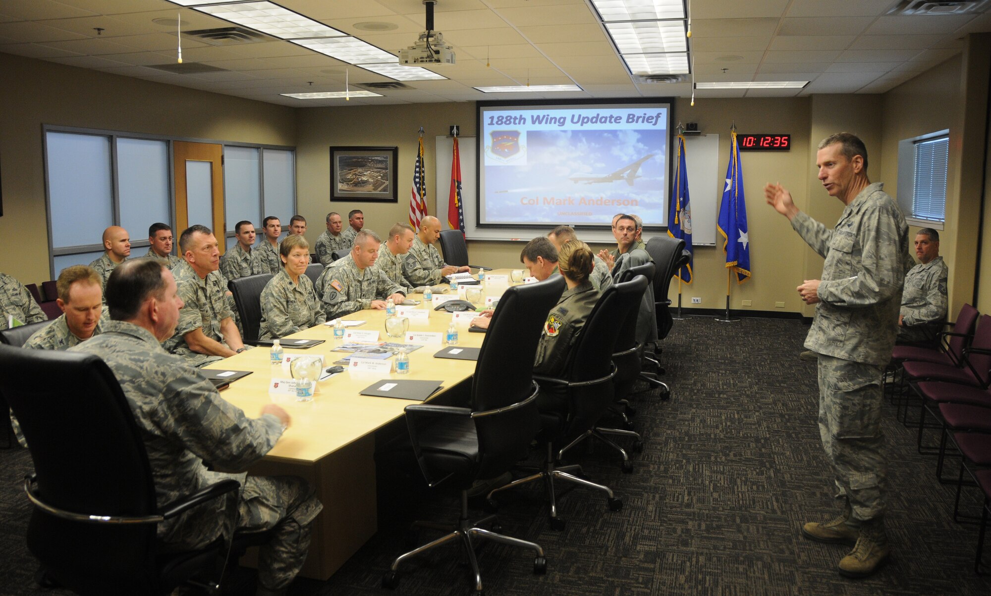 Col. Mark Anderson, commander of the 188th Wing, conducts a presentation for Maj. Gen. John Shanahan, commander of the 25th Air Force at Joint Base San Antonio-Lackland, Texas, Dec. 11, 2014, about the 188th and its mission capabilities at Ebbing Air National Guard Base, Fort Smith, Ark. Shanahan’s visit encompassed seeing and understanding how the wing’s new mission aligns with the 25th AF. (U.S. Air National Guard photo by Airman 1st Class Cody Martin/released)