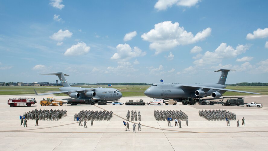 Personnel from the 436th Airlift Wing pose for a photo July 1, 2014, at Dover Air Force Base, Del. (U.S. Air Force photo/Airman 1st Class Zachary Cacicia) 