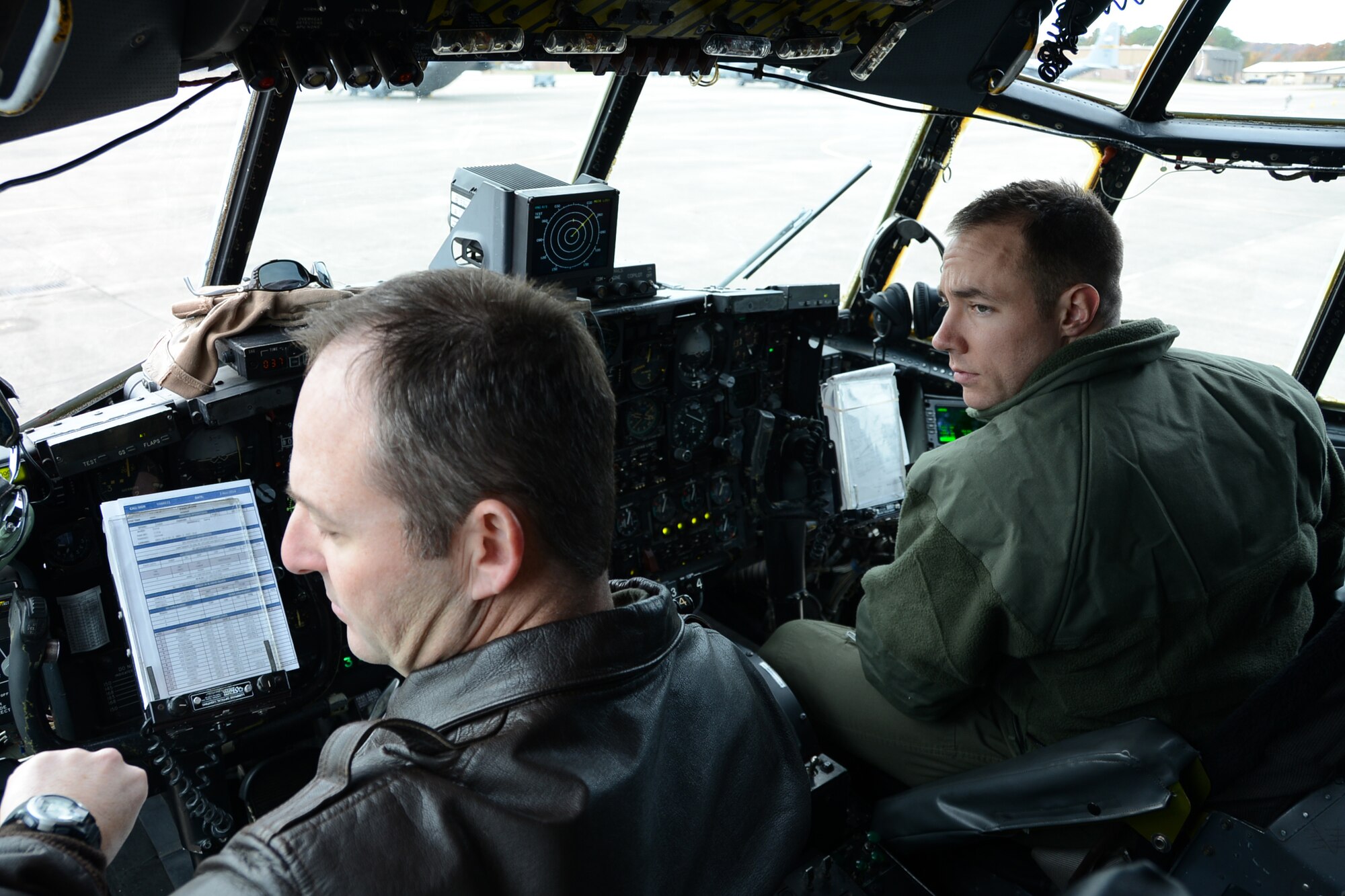 Lt. Col. William Daniels and Capt. Paul Bolduc, both pilots with the 103rd Operations Group prepare for takeoff at the controls of a C-130H Hercules aircraft assigned to the 103rd Airlift Wing, shortly after maintainers from the 103rd Maintenance Group prepared the aircraft as part of the unit’s first C-130H engine generation exercise, Nov. 1, 2014 at Bradley Air National Guard Base, East Granby, Conn.  “An aircraft generation is basically a sequence of events we follow to configure the aircraft for a particular mission within a specified timeframe,” said Master Sgt. Jonas Concepcion, production superintendent for the 103rd Maintenance Group.  (U.S. Air National Guard photo illustration by Maj. Bryon M. Turner)