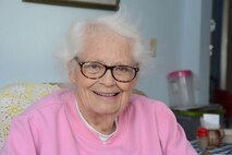 Merti Kurtti, of rural Rocklake, N.D., speaks about her recent car accident, which submerged her and her car into freezing cold slough water Nov. 12, 2014, near Churchs Ferry, N.D. Master Sgt. Grant Lonski, of the 119th Security Forces Squadron, and the North Dakota Highway Patrol, was first on the scene to pull her from the life-threatening water.(U.S. Air Force photo/Senior Master Sgt. David Lipp)
