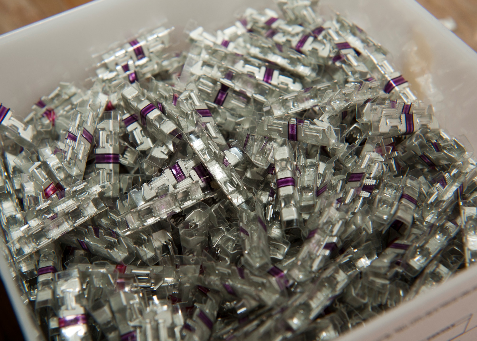 PETERSON AIR FORCE BASE, Colo. – A container of picabonds waits to be used to connect communication lines at the cable yard training area. The cable and antenna personnel have a training area dedicated to polishing the skills used to keep communications flowing smoothly around base. (U.S. Air Force photo by Airman 1st Class Rose Gudex)