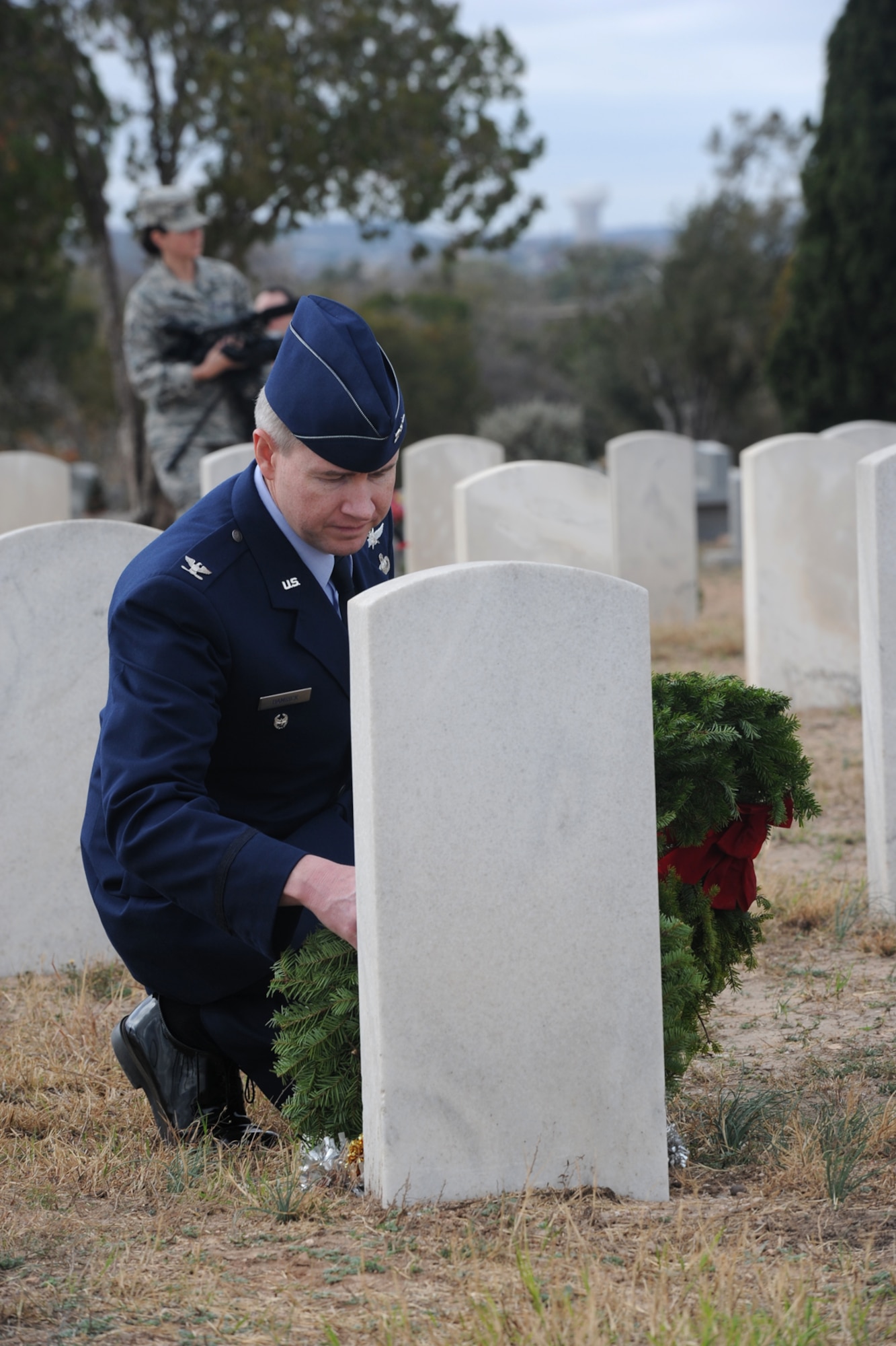 SAN ANGELO, Texas – Col. Terry J. Hamrick Jr., 17th Training Wing Vice Commander, places a wreath during the Wreaths Across America event at Belvedere Cemetery Dec. 13. Wreaths Across America honors deceased service members and their families. (U.S. Air Force photo/ Staff Sgt. Laura R. McFarlane)