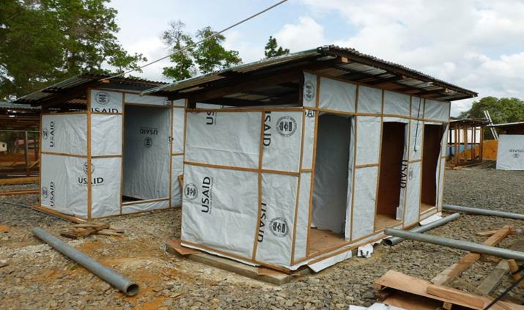 During a 60-day deployment, 11 U.S. Air Forces in Europe and Air Forces Africa Airmen, built Ebola treatment facilities in Liberia, Africa. The Air Force engineer team surveyed seven locations, setup living quarters for more than 500 incoming U.S. Army personnel and built several treatment facilities in conjunction with the Armed Forces of Liberia in continuing support of Operation United Assistance. (Courtesy photo)